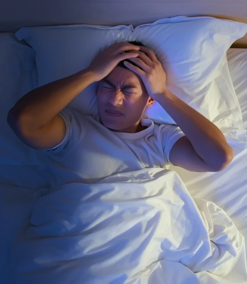 man experiencing headaches in Hudson WI